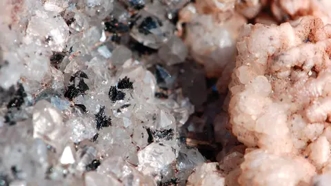 A close-up photograph of mineral crystals.