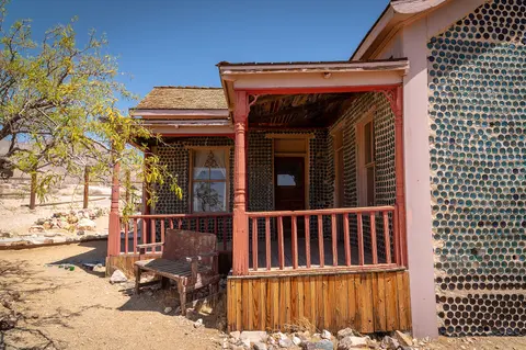 Porch and walls, Tom Kelly Bottle House.