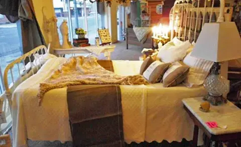 A display bed in a furniture store.