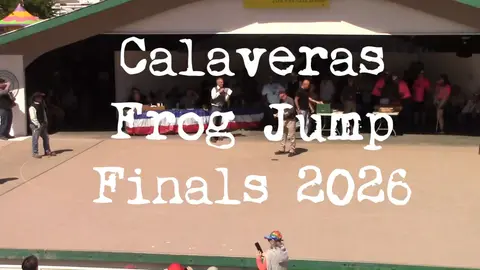 A photo showing people participating in a frog jumping competition on a stage with text overlaid.