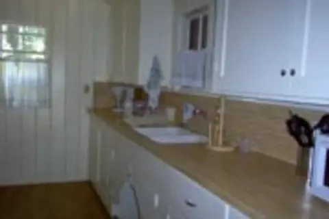 A photo showing the interior of a kitchen.