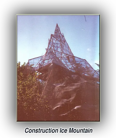 A photograph showing the construction of a mountain-like structure.