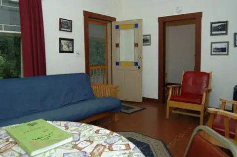 This is an interior view of a living room with furniture.