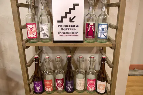 Bottle display, Superstition Meadery.
