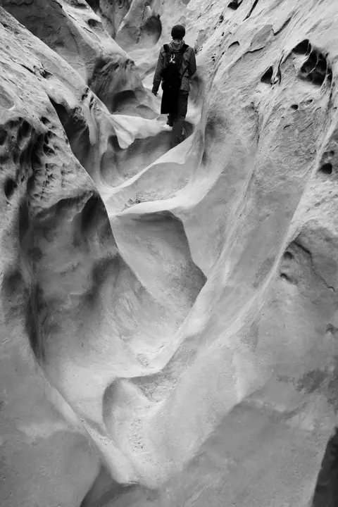Hiker in Little Wild Horse Canyon.