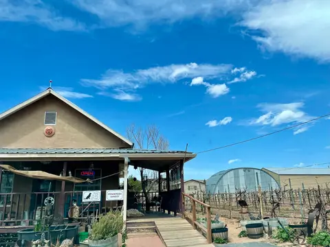 Tasting room and vines, Ponderosa Valley Vineyards.