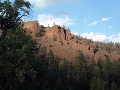 Red cliffs along Buffalo Bill Cody Scenic Byway.