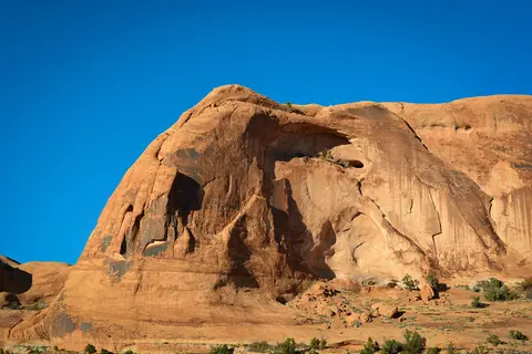 Sandstone cliffs along Corona Arch Trail.